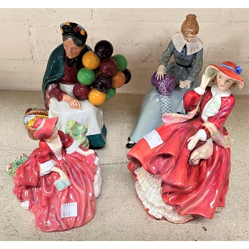 643 - Four Royal Doulton figures:  Old Balloon Seller HN1315; Top o'the Hill HN1934; Dorothy HN3098 &... 