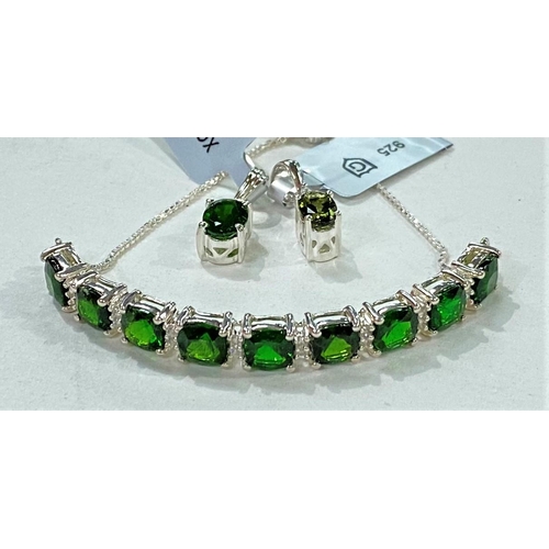 680a - A chrome diopside (9) and white Zircon (20) hallmarked silver slider bracelet; a chrome diopside hal... 