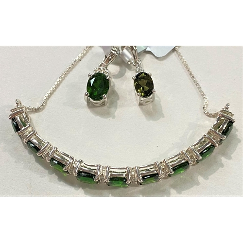 680a - A chrome diopside (9) and white Zircon (20) hallmarked silver slider bracelet; a chrome diopside hal... 