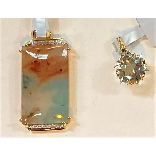 683 - A 9 carat hallmarked gold pendant set large aquaprase, rectangular cabochon 18 carat stone, 14 small... 