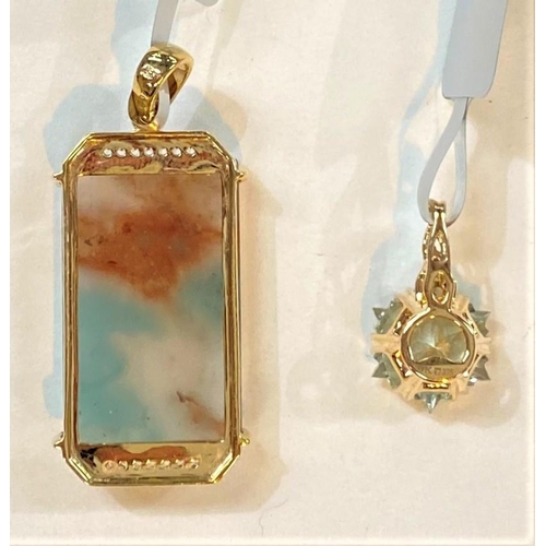 683 - A 9 carat hallmarked gold pendant set large aquaprase, rectangular cabochon 18 carat stone, 14 small... 