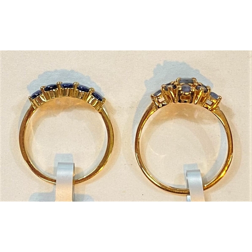 689 - A 9 carat hallmarked gold dress ring set row of Kanchanaburi sapphires, 1.46 carat, 1.71gm; a 9 cara... 