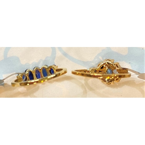 689 - A 9 carat hallmarked gold dress ring set row of Kanchanaburi sapphires, 1.46 carat, 1.71gm; a 9 cara... 