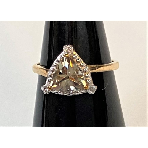 693 - A 9 carat hallmarked gold dress ring set triangular Csarite and 3 small diamonds, size L/M, 7 x 7mm,... 