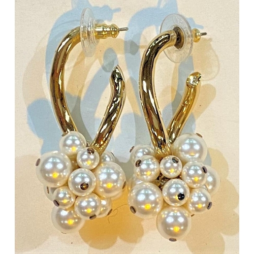 711 - Three pairs of Swarovski earrings:  1 single clear crystal; 1 triple red crystal drops; 1 ... 