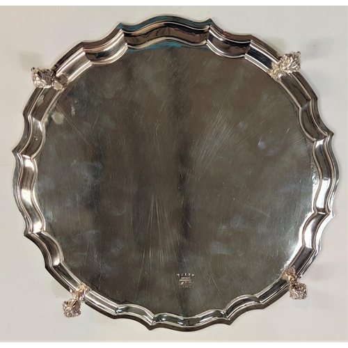 720 - A silver plated set of 3 oval graduating platters; a Georgian style salver; a gadrooned circular tra... 