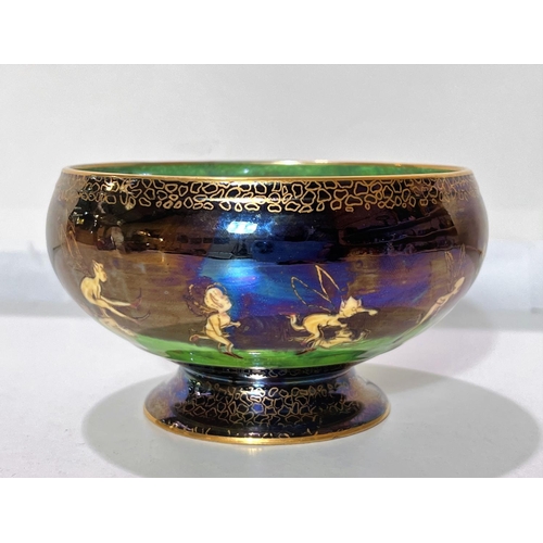 637 - Daisy Makeig-Jones - a Wedgwood Fairyland luster Empire style pedestal bowl with Leapfrogging Elves ... 