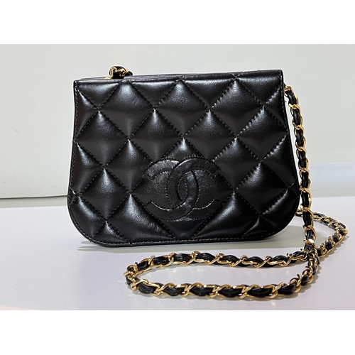 166 - A black soft lamb leather cross body double flap bag with embossed CC logos to front and back flaps ... 