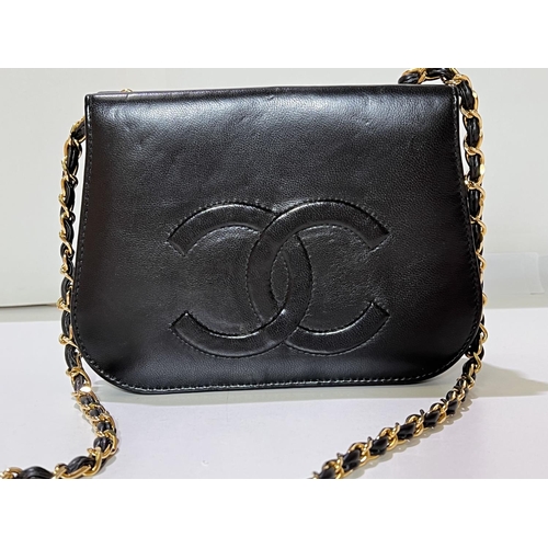 166 - A black soft lamb leather cross body double flap bag with embossed CC logos to front and back flaps ... 