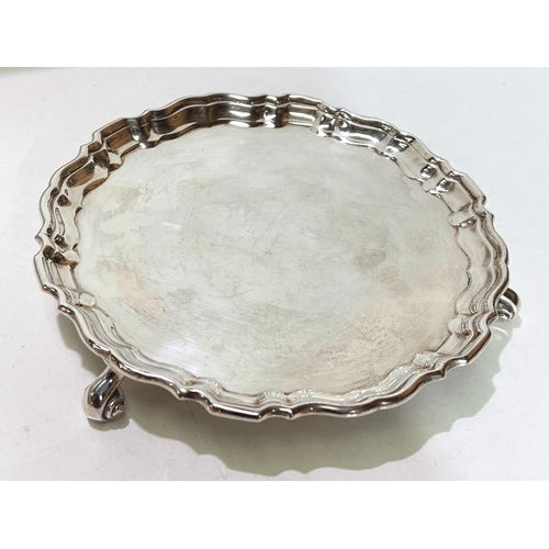 655 - A small hallmarked silver salver with pie crust border with knurled feet, dia 15cm, weight 5.2oz She... 