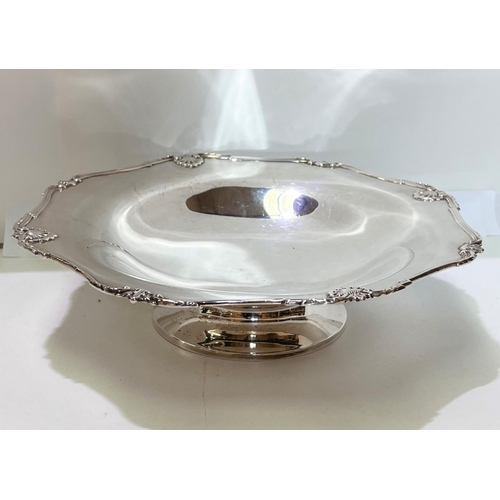 656A - A Scottish hallmarked silver pedestal bowl with shell decoration border with raised foot, Edinburgh ... 