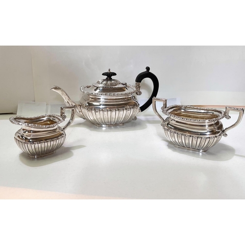 657 - A Victorian 3 piece hallmarked silver Batchelors tea service with ebonised handle and finial ribbed ... 