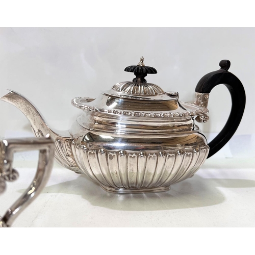 657 - A Victorian 3 piece hallmarked silver Batchelors tea service with ebonised handle and finial ribbed ... 