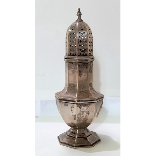 696 - A Georgian style silver sugar caster of octagonal baluster form, maker EV, London 1935, 5.2oz