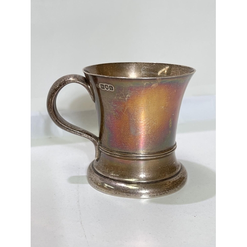 700 - A silver half pint tankard, maker C.E., London 1914, 9.5oz