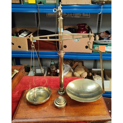 1 - A brass and oak set of balance scales with weights