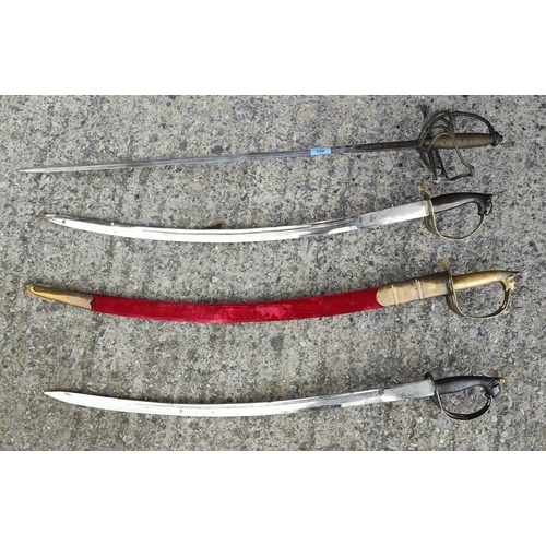 152 - An Italian style reproduction basket hilt rapier sword and three Indian lion hilted display swords