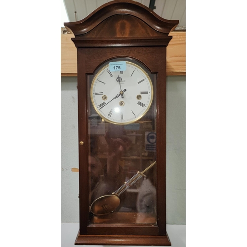 175 - A mahogany cased Comeitti London wall clock with striking movement