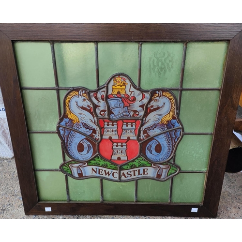 190A - An oak framed leaded stained glass crest of Newcastle 60 x 63cm with frame