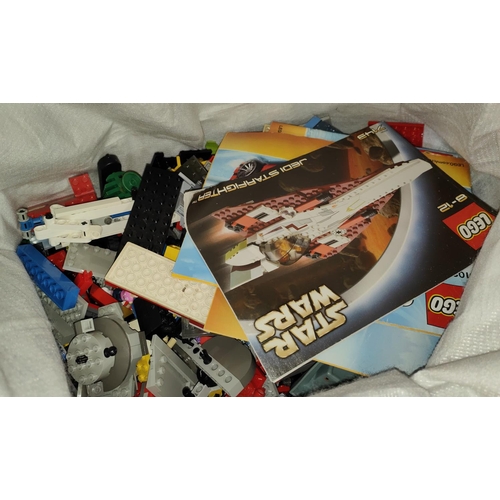 206 - A very large selection of Lego pieces including Lego Star Wars AT-AT and X-Wing instructions and par... 