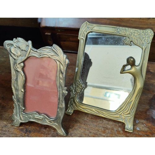 24 - Two Art Nouveau free standing mirror, one brass and one plated