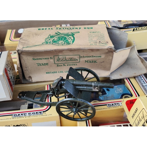 274 - An early boxed W. Britains R.A No 1201 Royal Artillery Gun and a selection of Lledo cars and vehicle... 