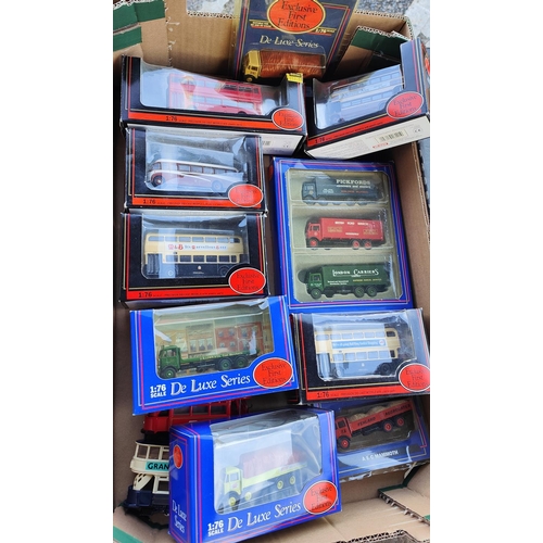 299 - A good selection of Exclusion First Editions boxed diecast vehicles including De Luxe series etc app... 