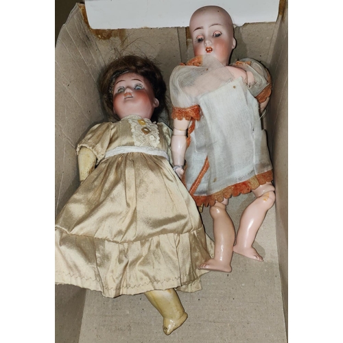37 - Two 19th century continental porcelain head dolls with jointed bodies, 25cm