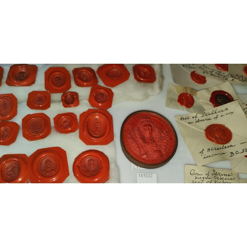 52 - A 19th century red wax seal of Queen Elizabeth I, gilt surround, 6.3cm and a collection of 19th cent... 