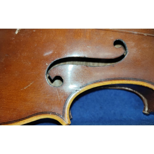 66A - A late 19th/early 20th century two piece back violin in case, with bow.