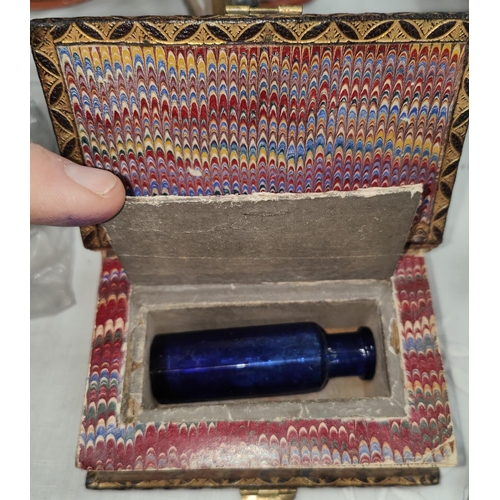 77A - Clouds of Happiness, small book with hidden interior compartment for opium vial, with Bristol blue v... 