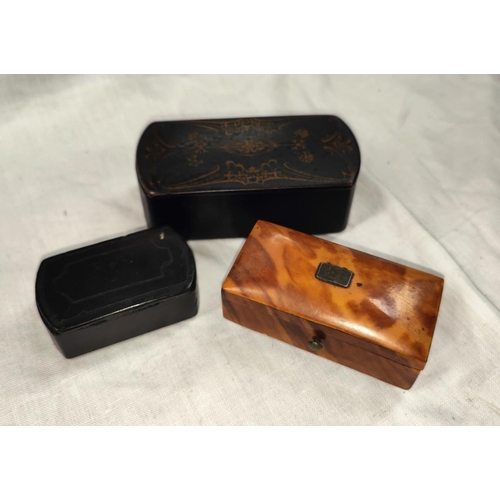 77B - A tortoise shell hinged miniature box and two papier mache boxes.