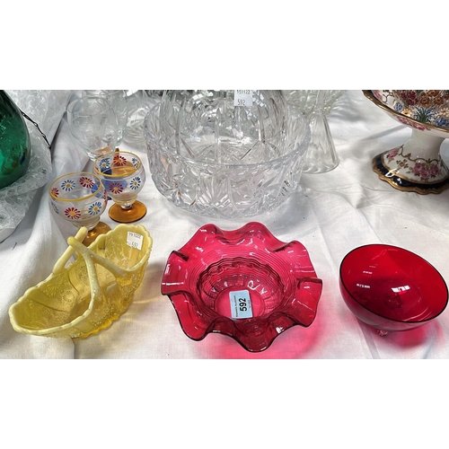 592 - Two pieces of cranberry glass; a Vaseline glass boat shaped bowl; decanters and glassware