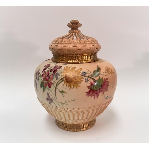 595 - A Royal Worcester potpourri vase of squat form with reticulated and inner covers, decorated with han... 