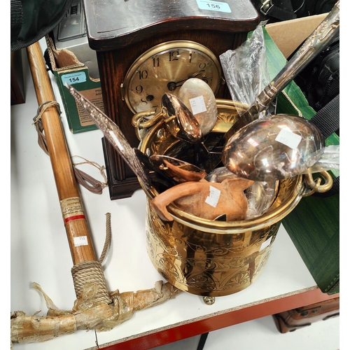 156 - A mountaineering climbing axe with vintage    travel label; a 1930's oak cased clock and a brass han... 