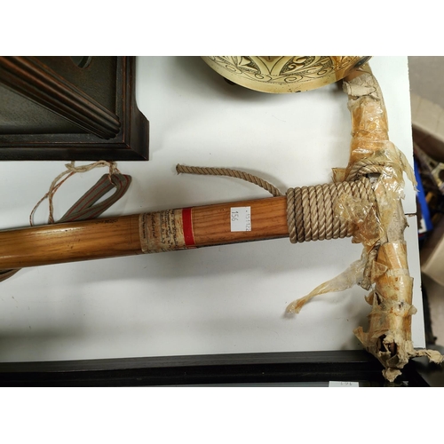 156 - A mountaineering climbing axe with vintage    travel label; a 1930's oak cased clock and a brass han... 