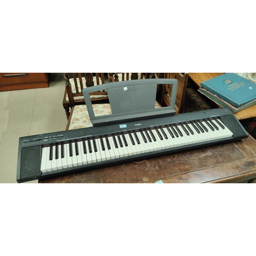 63 - A Yamaha electric keyboard 'Portable Grand' NP30(Sold with next lot)