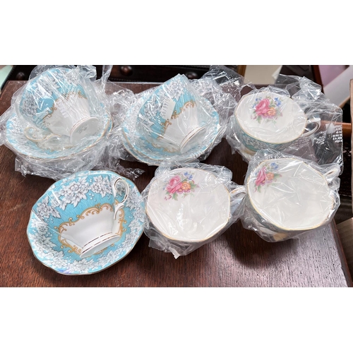 649 - A Royal Albert set of 6 cups and saucers 'Enchantment'