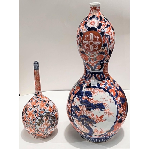 450 - A Japanese Imari double gourd vase with gilt decoration, a Japanese Imari bottle vase (a.f.)