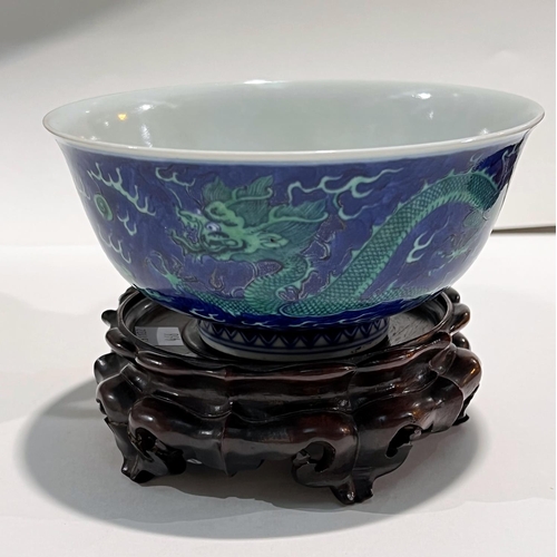 466 - A Chinese mottle blue ground bowl with green dragon decoration, bearing seal mark to base, diameter ... 