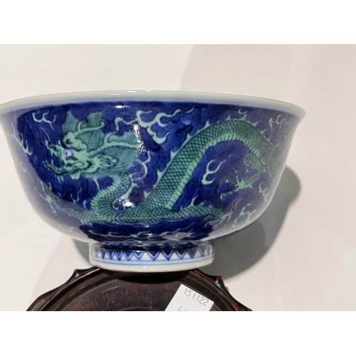 466 - A Chinese mottle blue ground bowl with green dragon decoration, bearing seal mark to base, diameter ... 