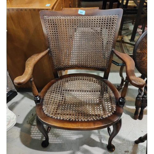 1003 - Two 19th century bergere armchairs with wooden seats and backs, pad feet etc.