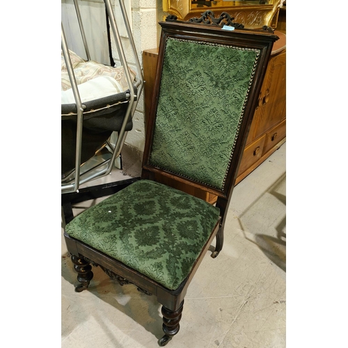 1009 - A 19th century rosewood pre dieu, with green upholstery.