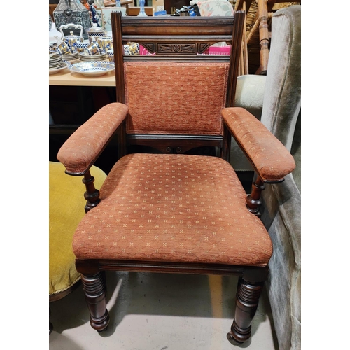 981 - A pair of mahogany armchairs on tuned legs and castors in rust upholstery; 3 oak dining chairs and 3... 