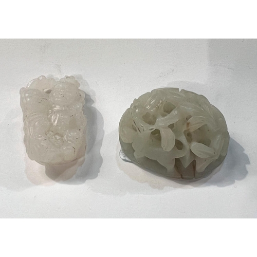 497 - Two Chinese carved items: A pair of small figures with instrument in white jade coloured hard stone ... 