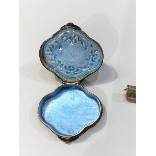 502 - A Chinese white metal box with enamel decoration, and a turquoise cabochon stone, with blue enamel i... 