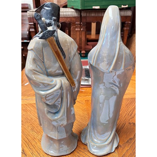 490 - A pair of Chinese porcelain figures of male and female Immortals, height 43cm