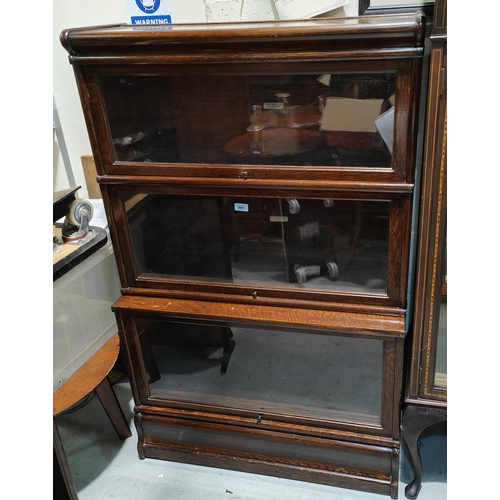 969 - An early 20th century oak 3 height stacking bookcase by Globe Wernicke