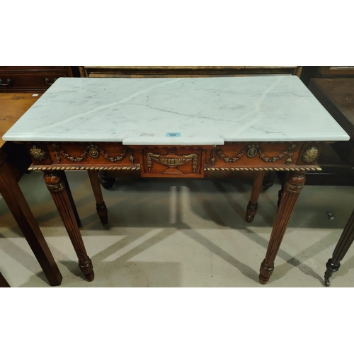 992 - An empire style hall table with stepped font and marble top.