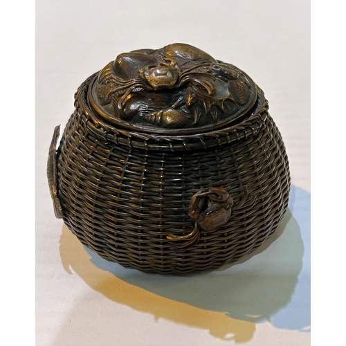 448A - A Japanese copper ink well in the form of a fisherman's basket with various creatures in relief, gla... 